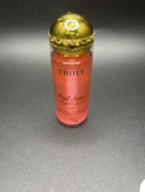 TRULY Soft Serve Luxury Lip Oil — Coral Orange with Gold Cap